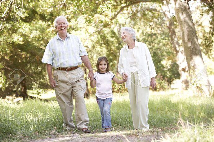 8483346-Grandparents-In-Park-With-Granddaughter-Stock-Photo-grandparents-grandchildren