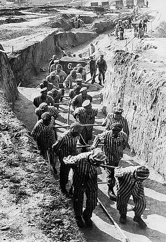Prisoners_hauling_earth_for_the_construction_of_the__Russian_camp__at_Mauthausen