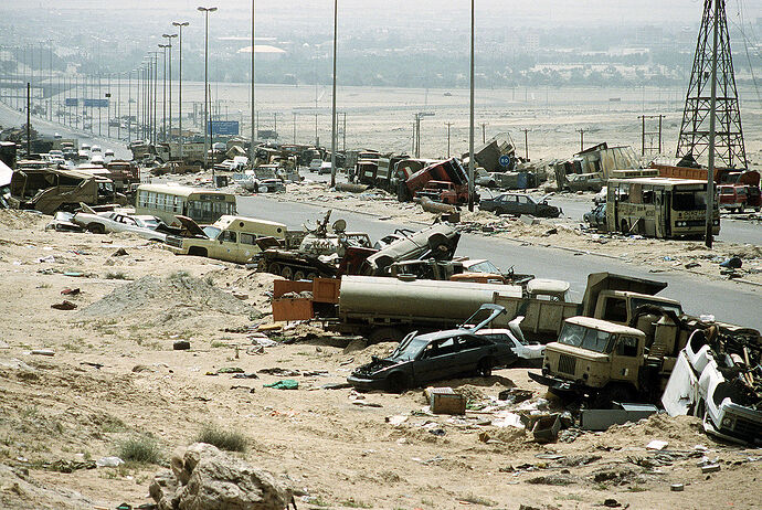 1280px-Demolished_vehicles_line_Highway_80_on_18_Apr_1991