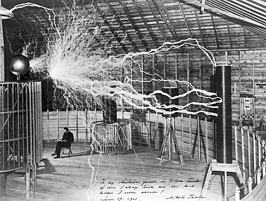 Nikola_Tesla,_with_his_equipment_Wellcome_M0014782